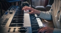 man-composer-producer-arranger-songwriter-musician-hands-arranging-music