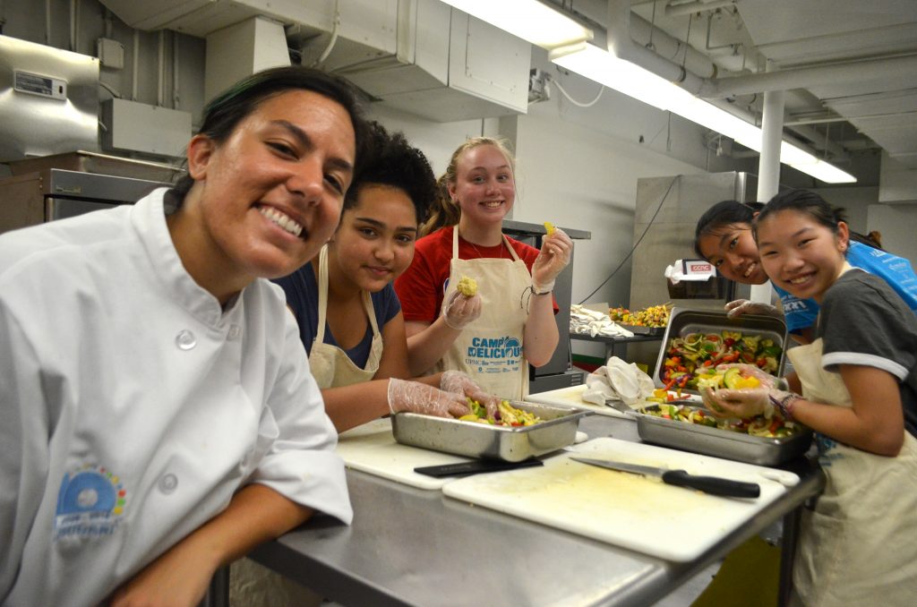 Camp Delicious! students with sous chef Taylor Flora