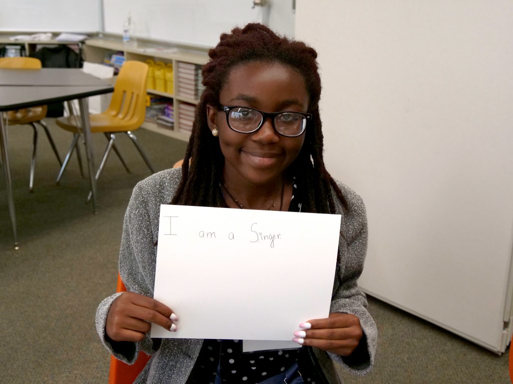 Teen Speaker Nyeisha shares his I AM statement during Speak & Tell! Camp 2019